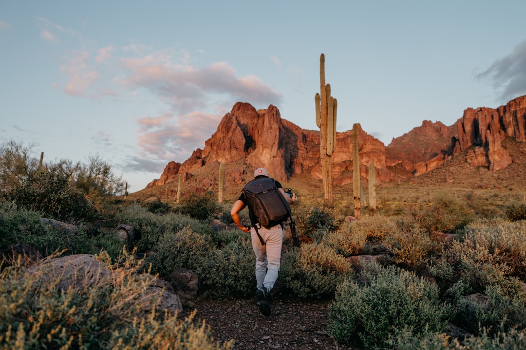 A scenic wide-angle travel photo showcasing an iconic American landscape (e.g., Rocky Mountains or a